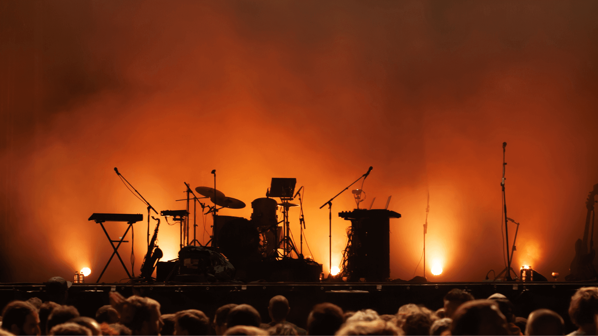 A drum kit on stage at a live show